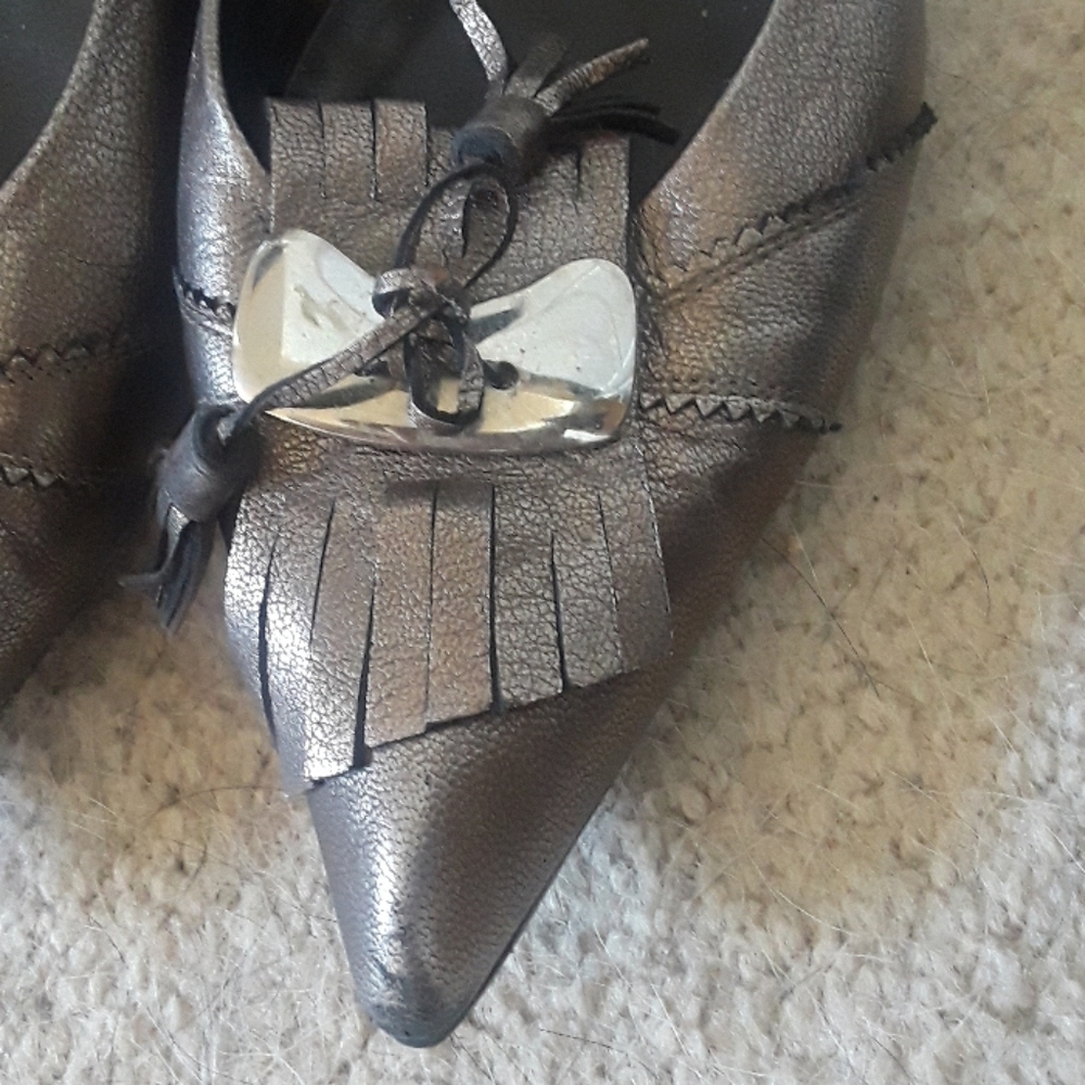 Silver shoes black ones